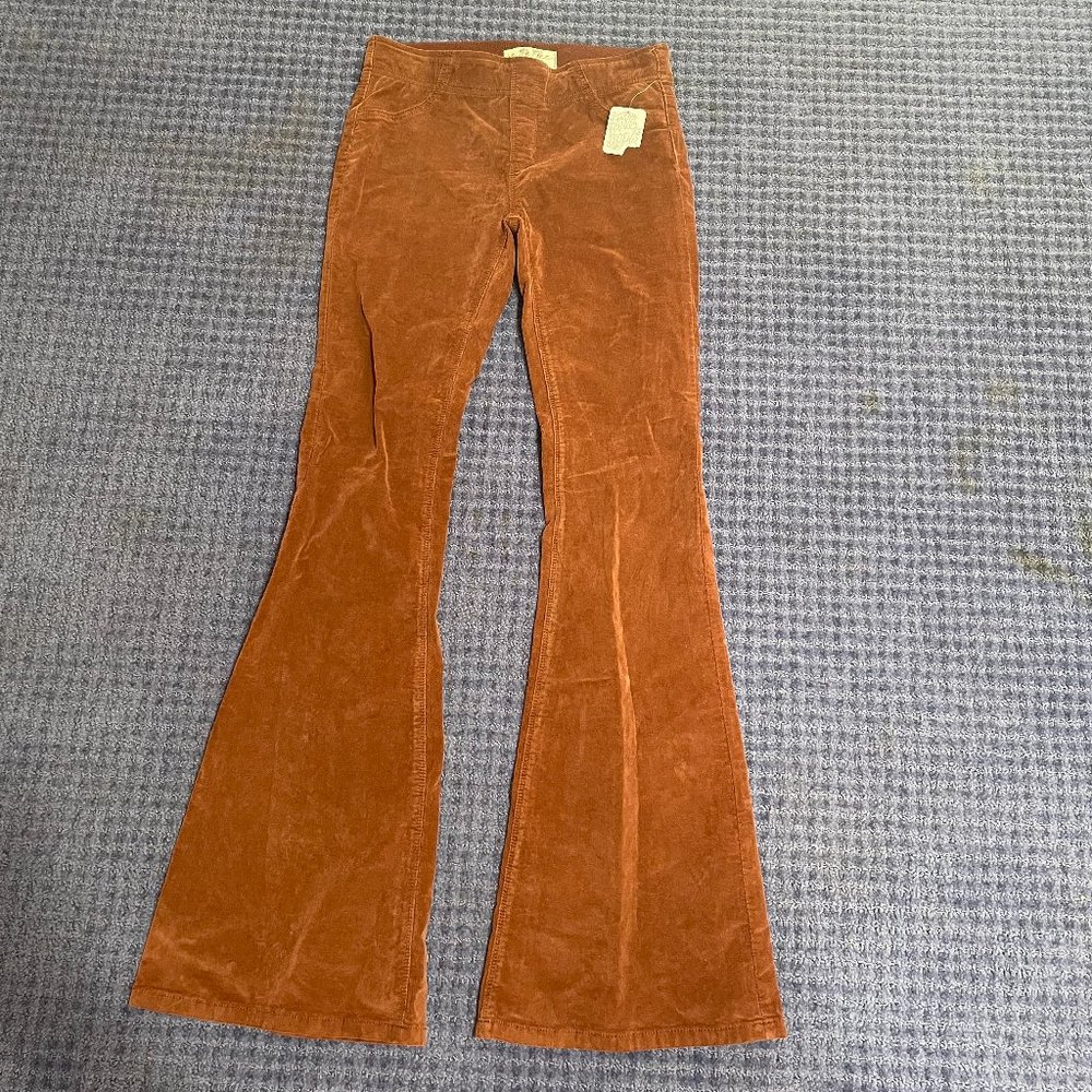 High waisted light brown bell bottoms.